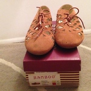 Laser cut  tan oxfords.