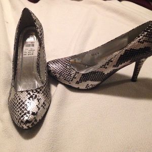 Leopard print heels, never worn.