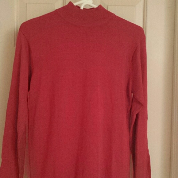 Mock turtle-neck sweater.