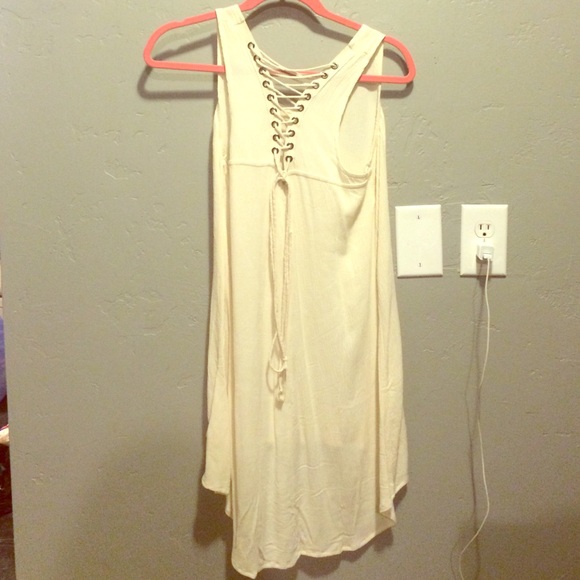 Cream colored with a corset back high low dress