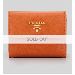 Prada preloved saffiano mini bi-fold