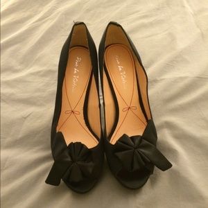Pour la Victoire satin platform pumps with bow