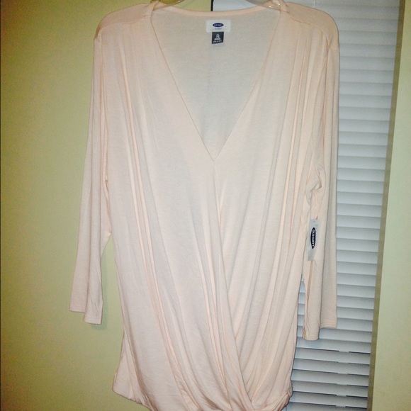 A peach colored shirt brand new