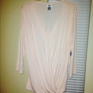 A peach colored shirt brand new