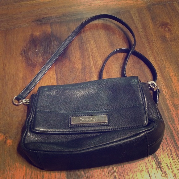 Very cute Calvin Klein purse just a little ripped
