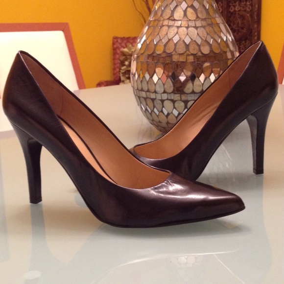 Black leather pumps