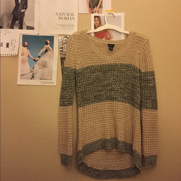 Green and beige sweater