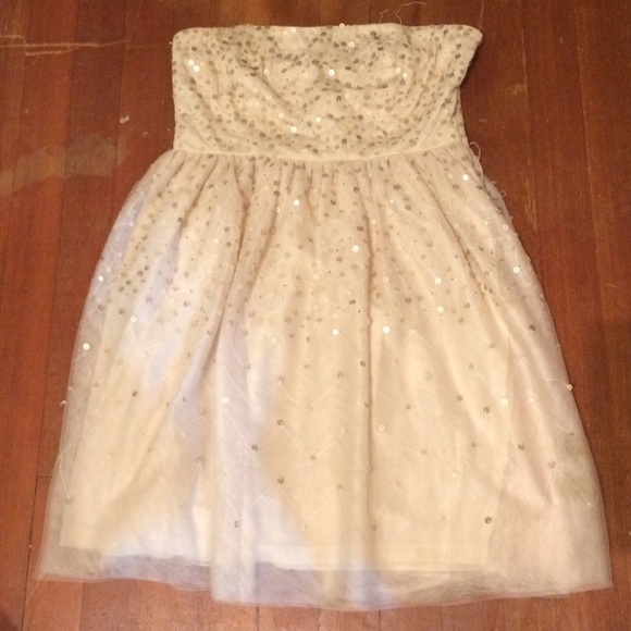Formal cream dress with gold sequins. Strapless