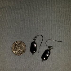 Small silver bean shaped earrings