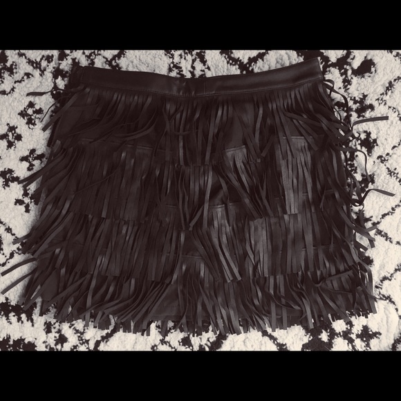 Leather fringed mini skirt.