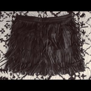 Leather fringed mini skirt.