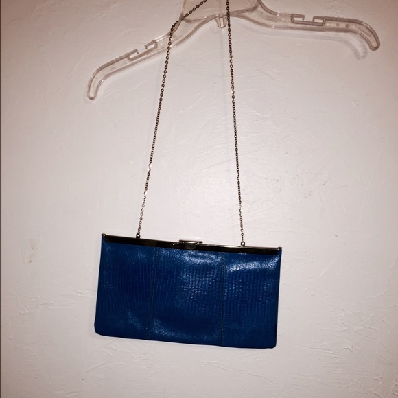 Vintage bright blue purse with good chain.