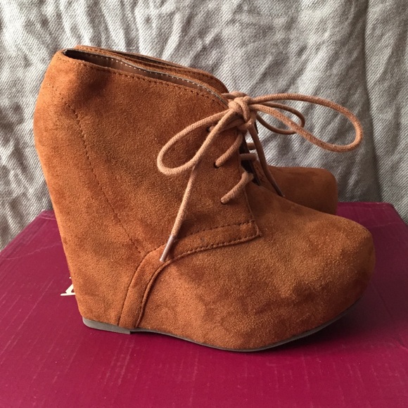 Brown wedge booties