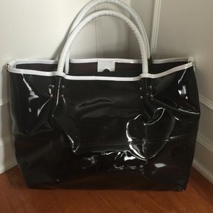 Black patent leather bag & laptop insert.