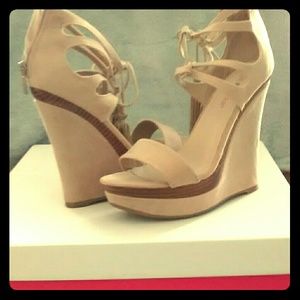 Sexy lace up with tassle wedge platform.