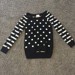 A cute sweater that is perfect for casual events