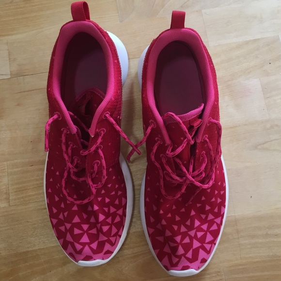 Red and Pink Nike Roshe