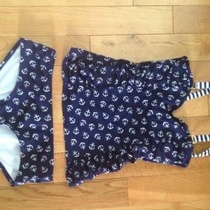 Delia's navy bathing suit