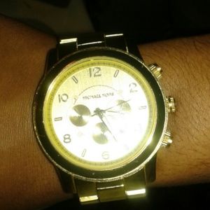 Mens gold mk watch