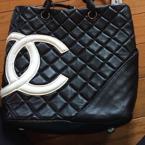 Beautiful Chanel small tote, and it is authentic.