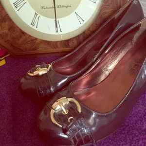 Dark brown with gold buckle