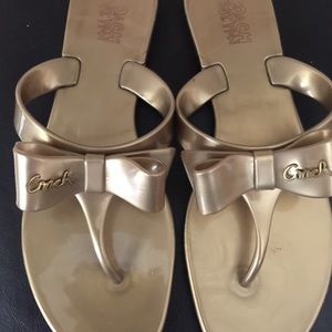 Coach authentic jelly style gold sandals