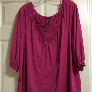 Fuscia colored top.