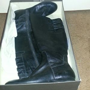 Enzo Angiolini knee high boots.