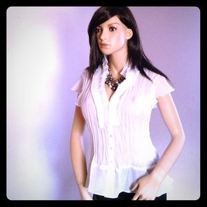 Beautiful and delicate ruffled white top