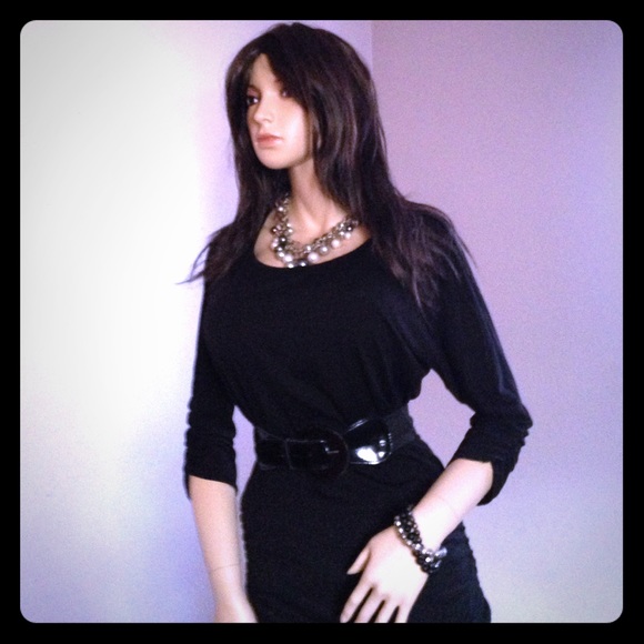 Black Poly/Spandex blended top with belt.