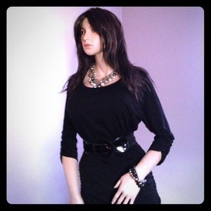 Black Poly/Spandex blended top with belt.