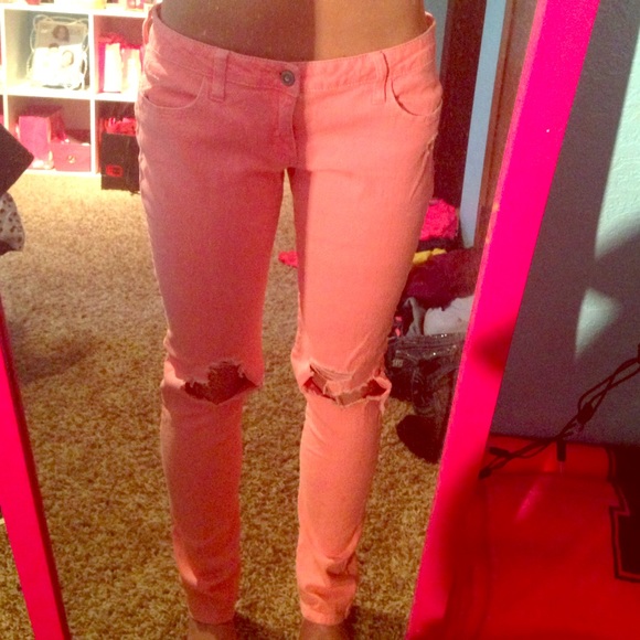 Peach distressed skinny jeans