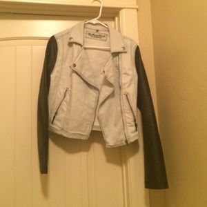 Light denim jacket with black faux leather sleeves