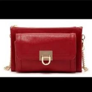 Red Ivanka Trump cross body bag.