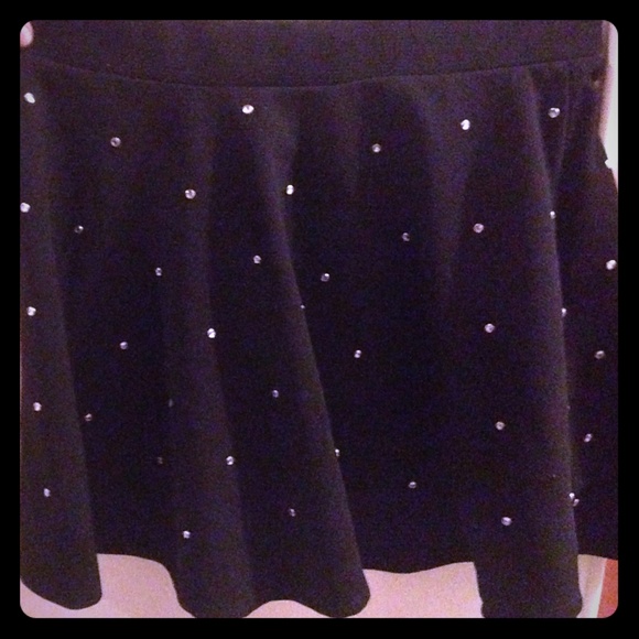 Black circle skirt w/ rhinestones.
