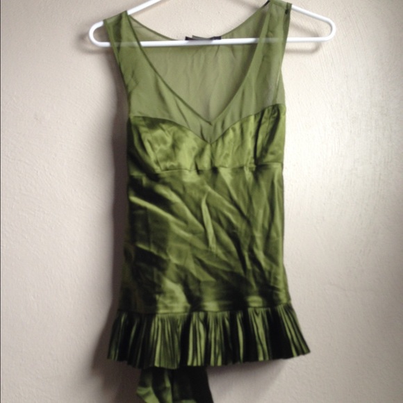 Slight peplum green blouse