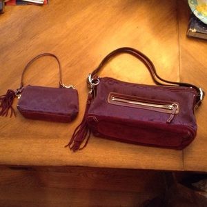 Matching purple coach clutch and purse