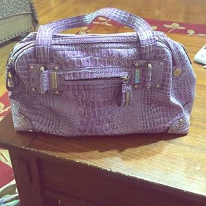 Purple Jessica Simpson purse.