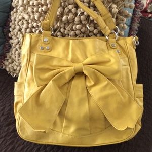 Yellow purse with bow