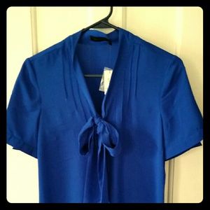 Blue sheer blouse with bow detail