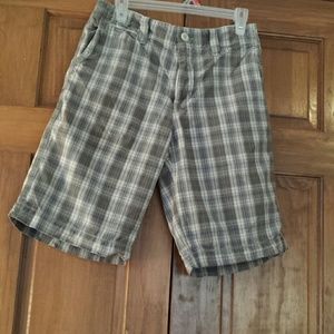 Men green short.