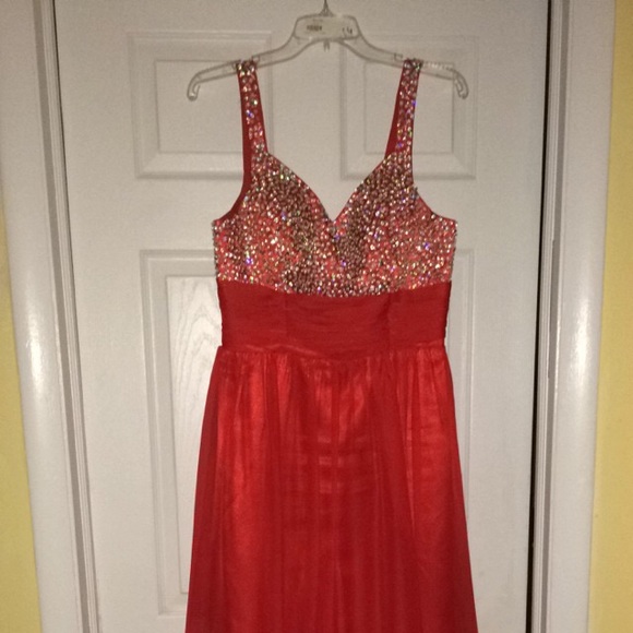 A long red prom gown with a beaded top - Picture 1 of 4