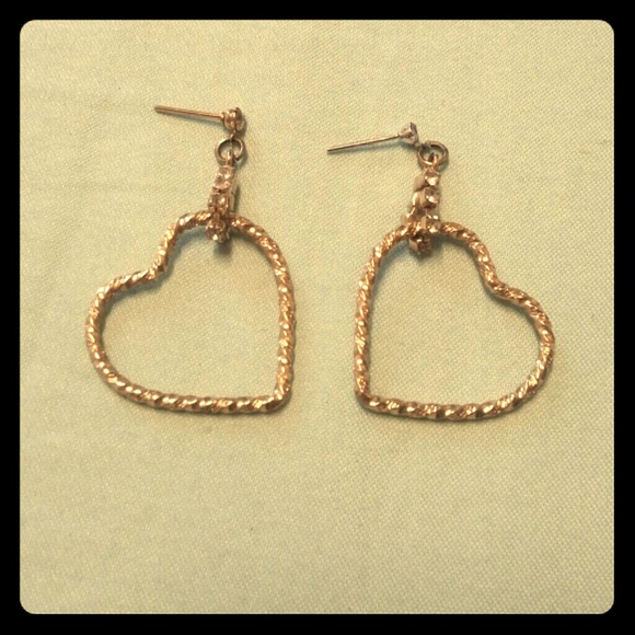 Dangling gold earrings with rhinestones