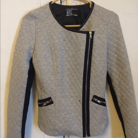 Gray and black leather jacket