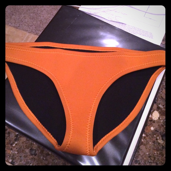 Sold!!! Triangl doupe! Never worn.