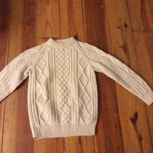 Classic wool cable knit sweater.