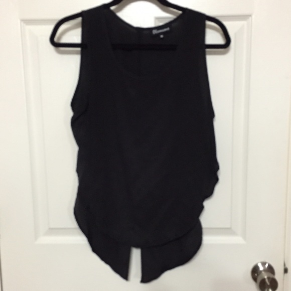 Sexy black short in front and long open back top.