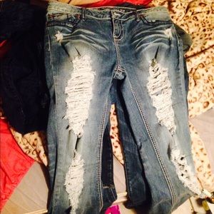 Blue asphalt jeans with rips.