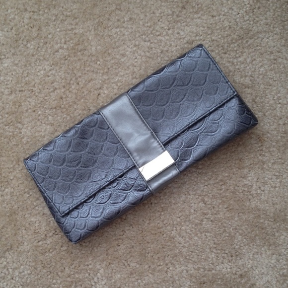 Metallic snakeskin clutch