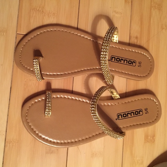 Gold flip flops